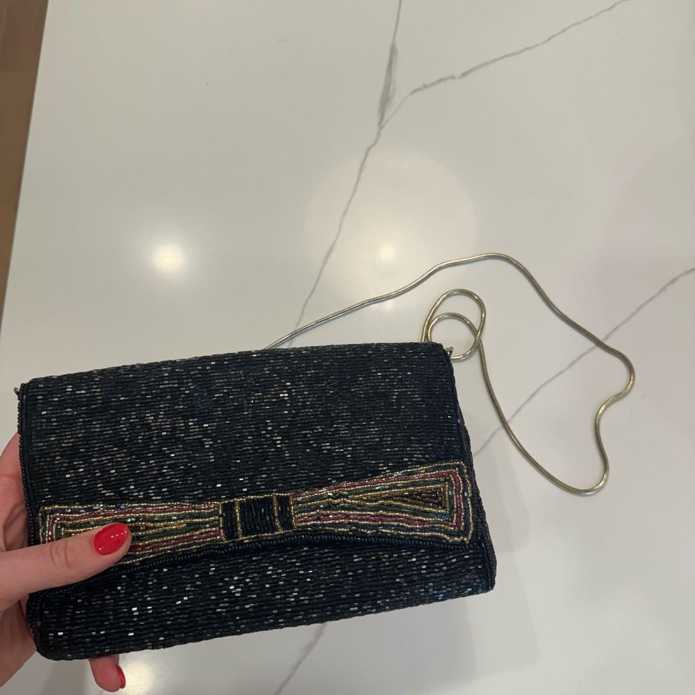 Black Sparkly Clutch with Gold Bow Accent